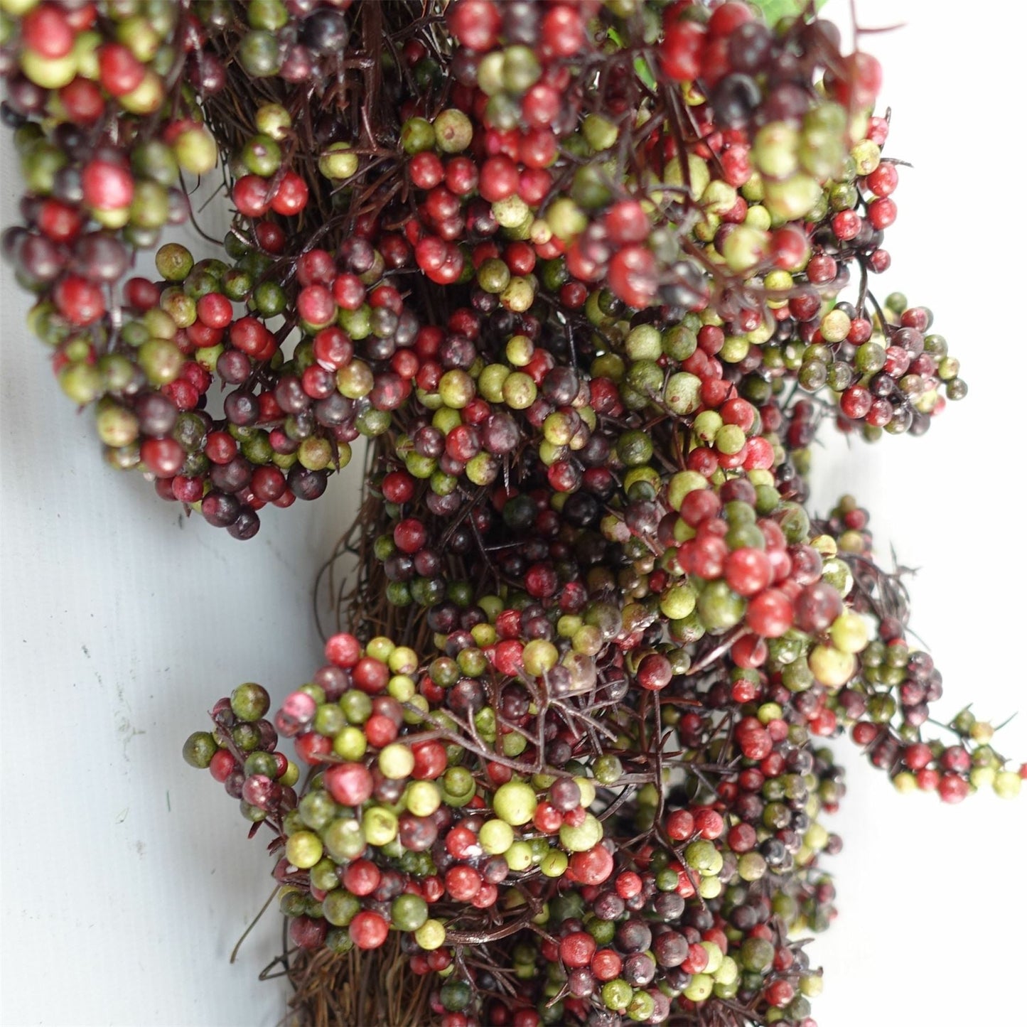 Black berry wreath 55cm close-up glossy berries foliage woven wicker detail UK