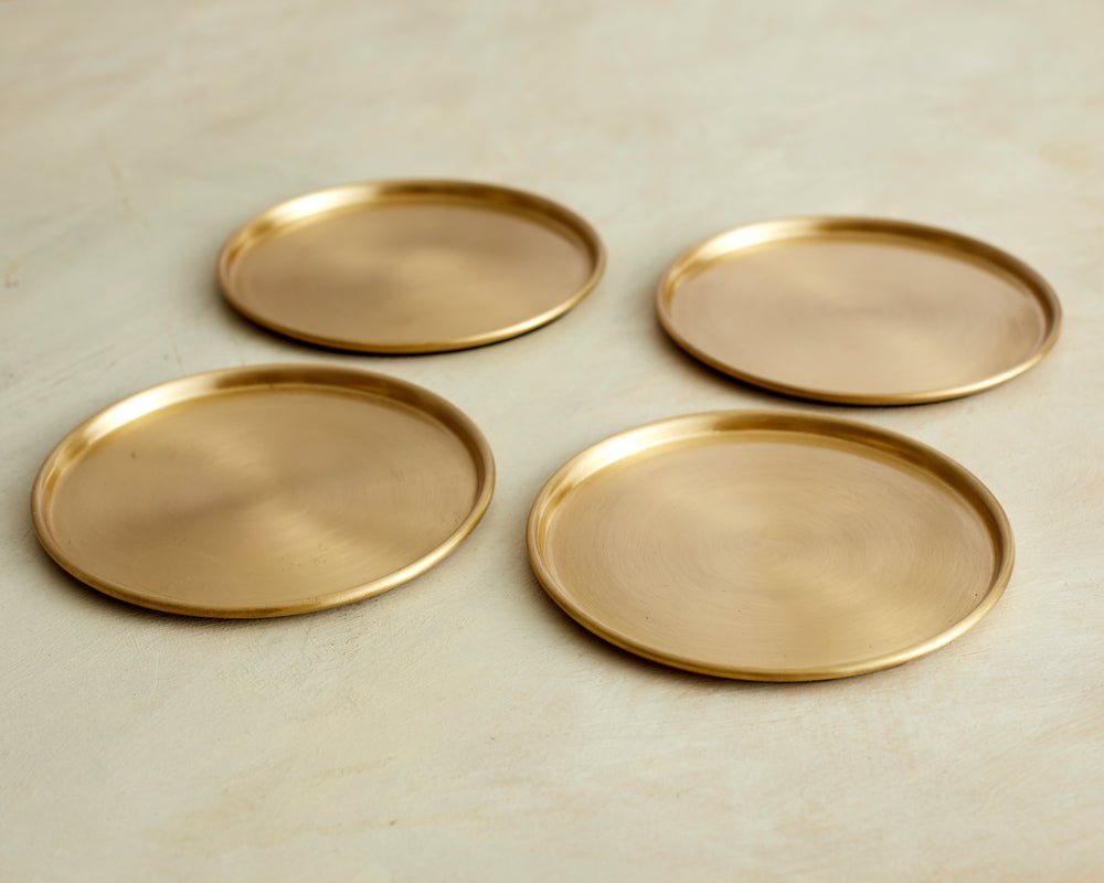Brass coaster set of 4 styled heritage sitting room table UK