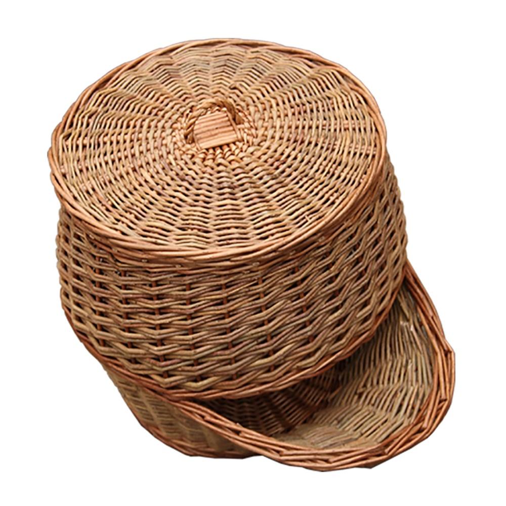 Handwoven double steamed willow potato storage basket in warm caramel tones. Rustic kitchen organiser with breathable weave.
