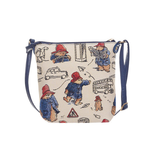 Front view of Paddington Bear™ sling bag in tapestry with adjustable strap and countryside charm