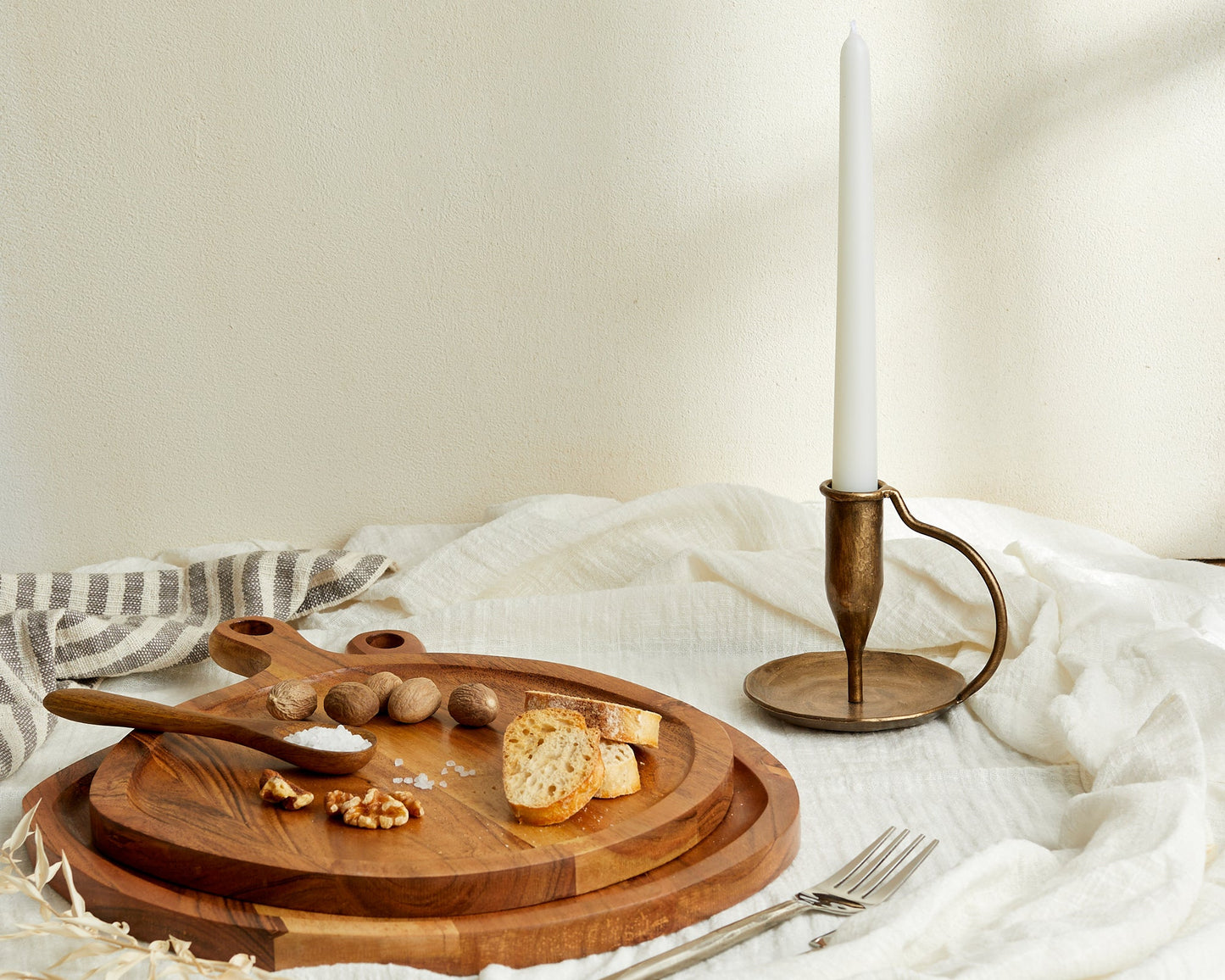 Richmond Serving Board Set in natural wood with spoons styled on table with candle holder beside