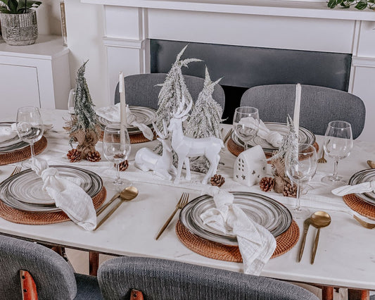 Snowfall Cottage ceramic tealight holder winter decor accent styled within a Christmas tablescape