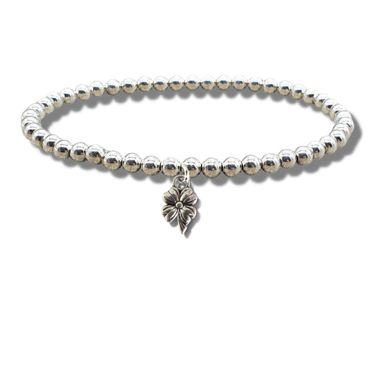 Wildflower silver bracelet close-up detail beaded charm jewellery UK