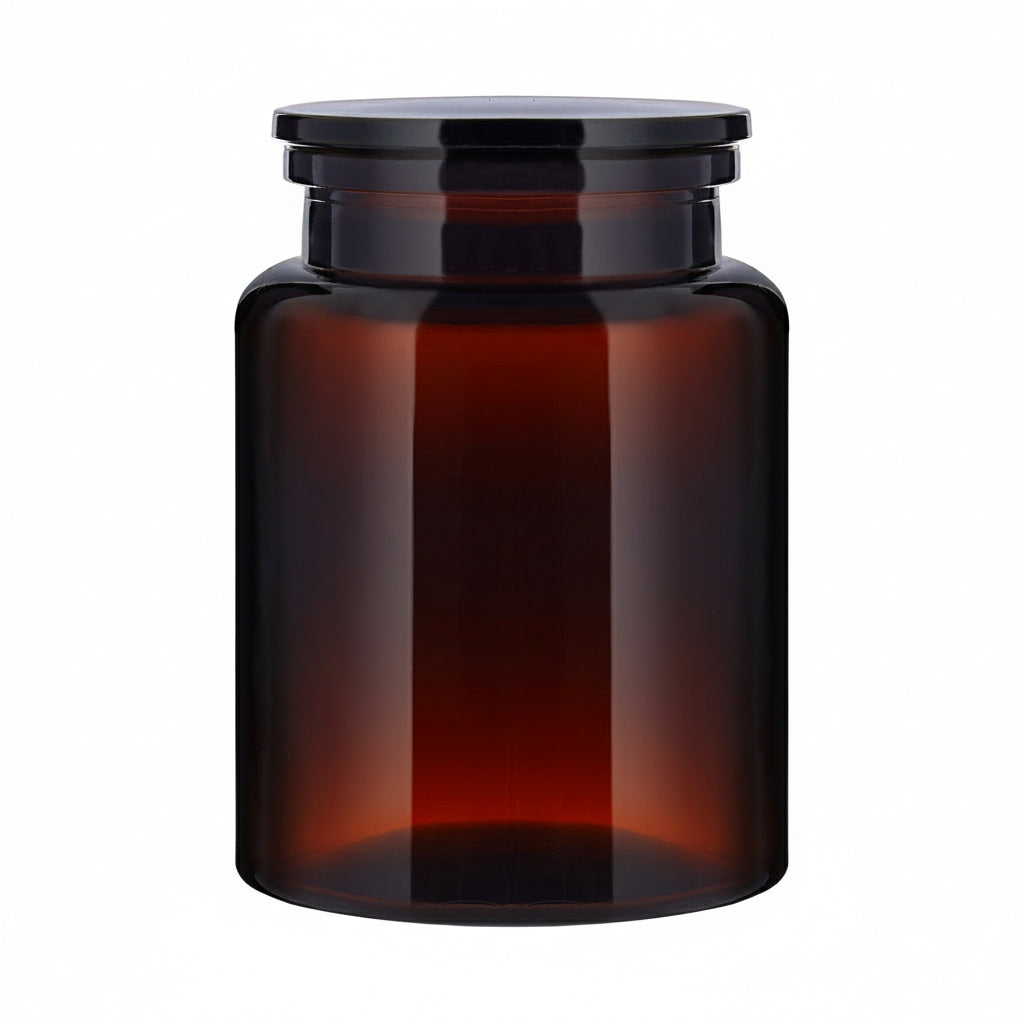 The Wetherby Amber Glass Storage Jar – large apothecary-style jar in translucent amber glass with wide-mouth design, styled for bath salts, cotton pads, or basin-side essentials.