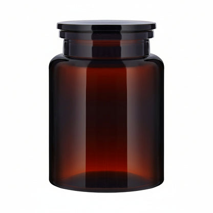 The Wetherby Amber Glass Storage Jar – large apothecary-style jar in translucent amber glass with wide-mouth design, styled for bath salts, cotton pads, or basin-side essentials.