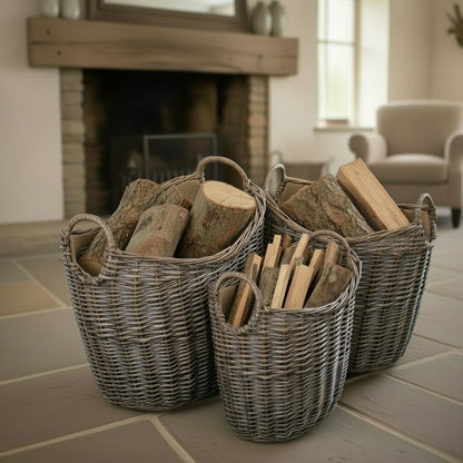 Wicker log baskets with hessian lining by a country house fire — rustic, eco‑friendly storage.