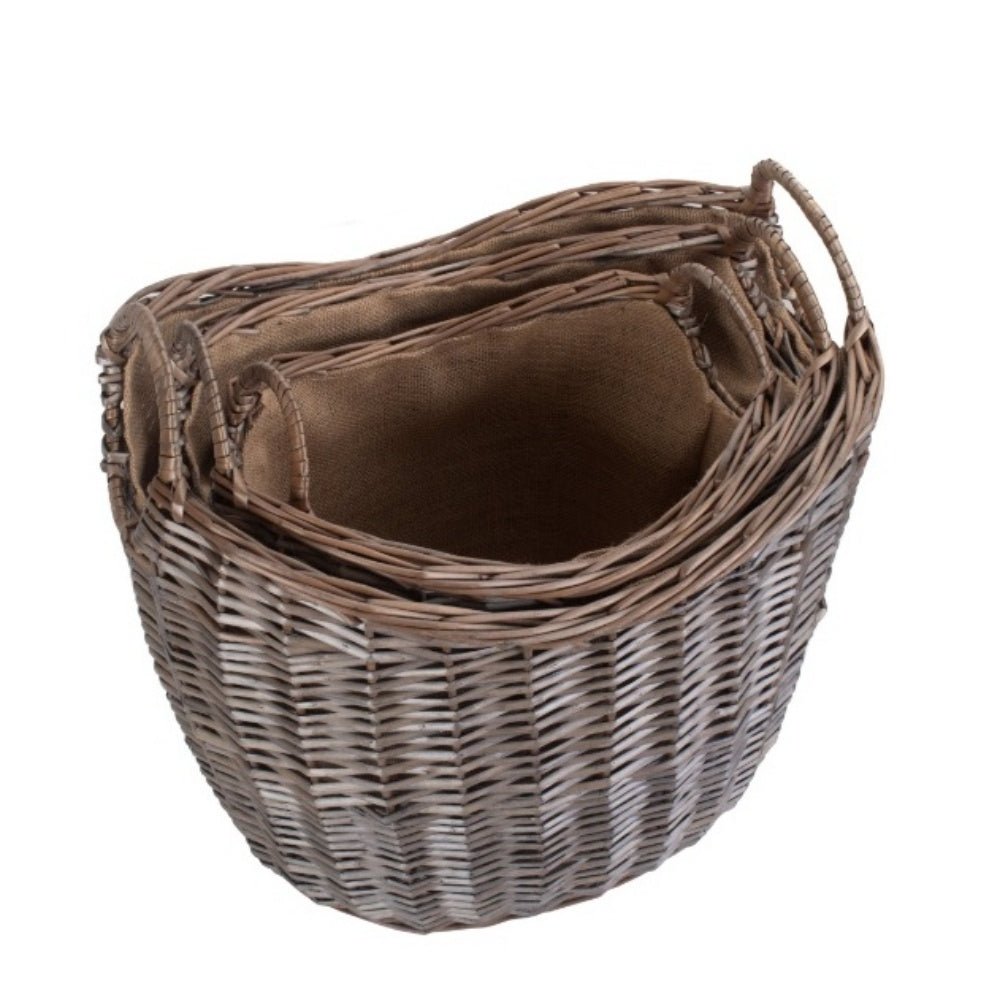 Set of 3 wicker log baskets with hessian lining — rustic, eco‑friendly fireside charm.