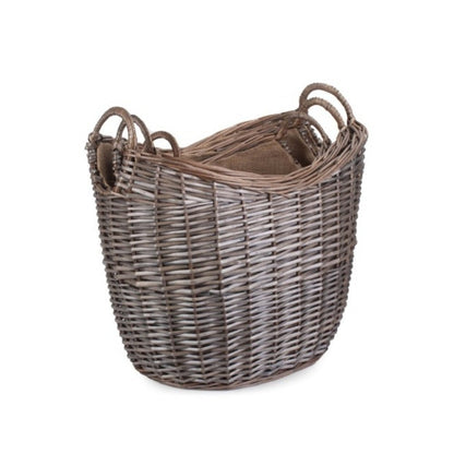 Set of 3 wicker log baskets with hessian lining, stacked for rustic, eco‑friendly fireside storage.