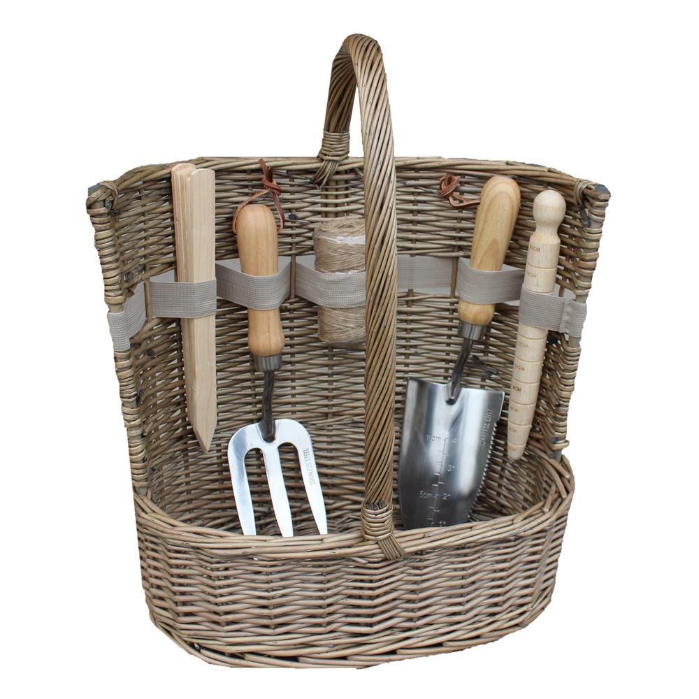 Antique wash willow garden basket with trowel, pruning shears and fork UK