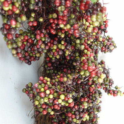 Black berry wreath 55cm close-up glossy berries foliage woven wicker detail UK
