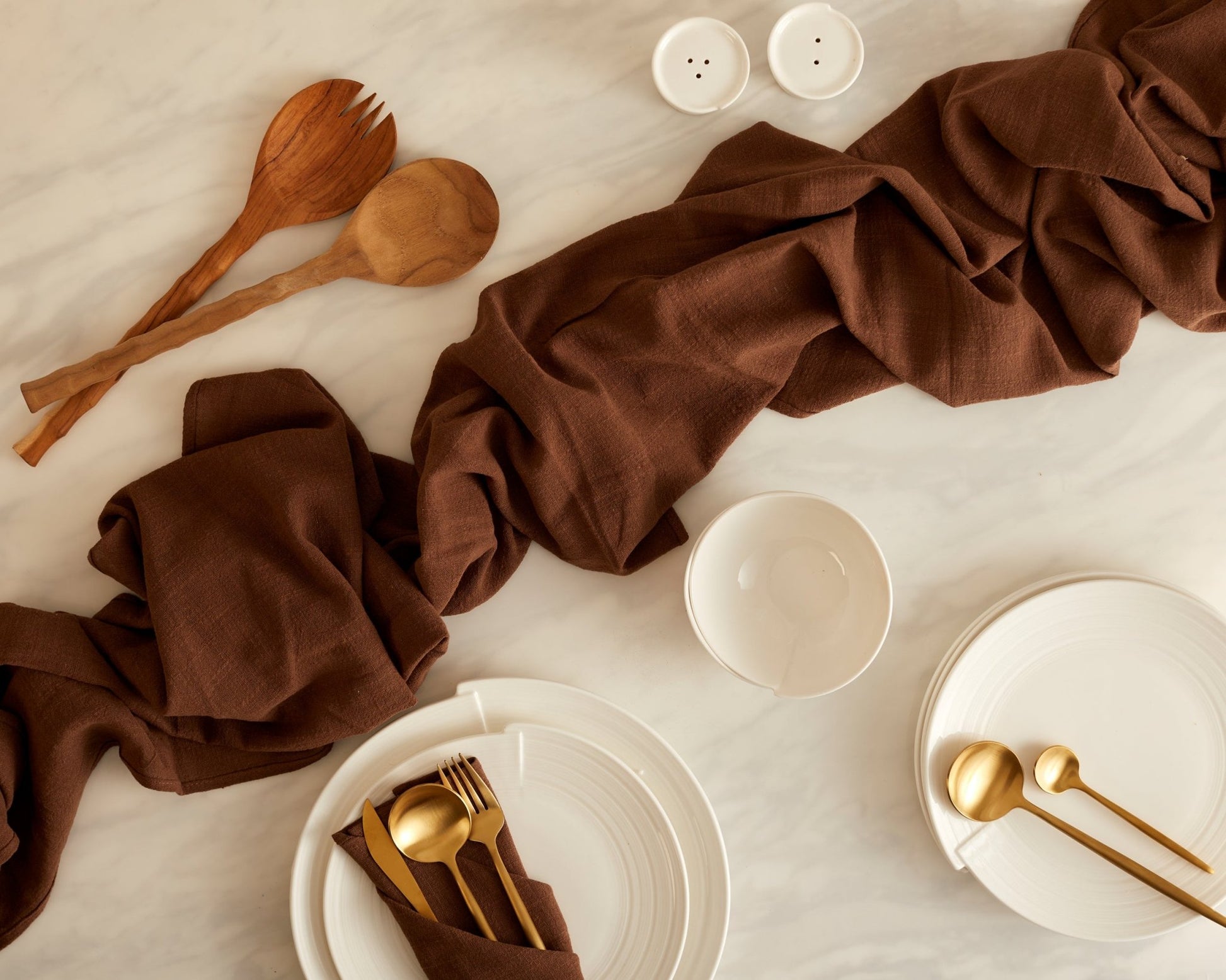 Branwell Brown gauze cotton linen table runner styled across centre of table
