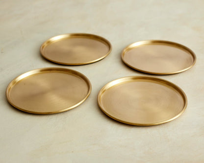 Brass coaster set of 4 styled heritage sitting room table UK
