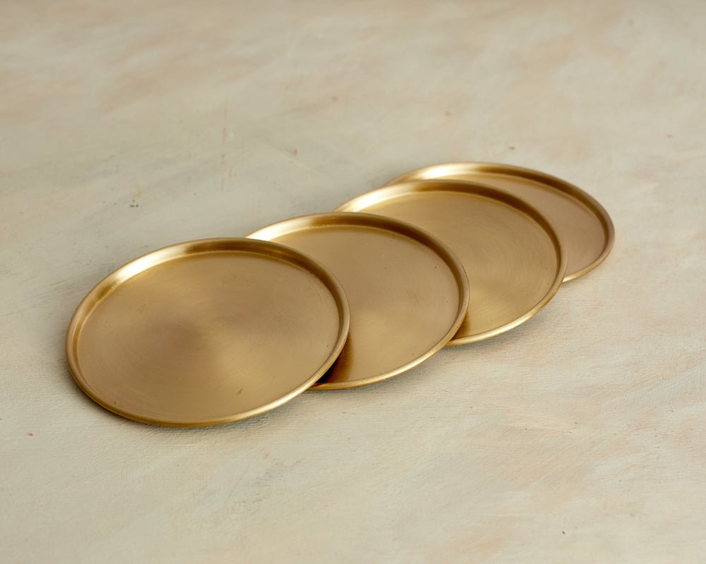 Solid brass coaster set of 4 spread cottage dining table UK
