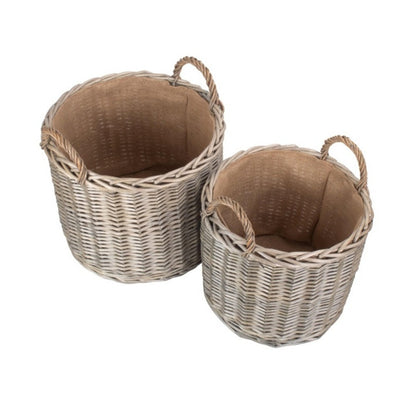 Cropthorne wicker basket traditional cottage hearth filled with logs UK home