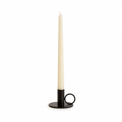Black iron candle holder with white taper candle product shot UK
