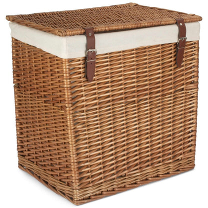 Closed view of large double steamed wicker laundry hamper with faux leather straps part of The Edwin Willow collection