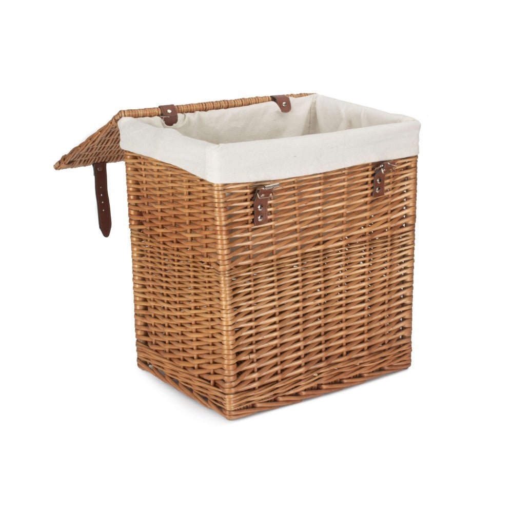 Open view of small double steamed wicker laundry hamper with removable cotton lining and faux leather straps, part of The Edwin Willow collection