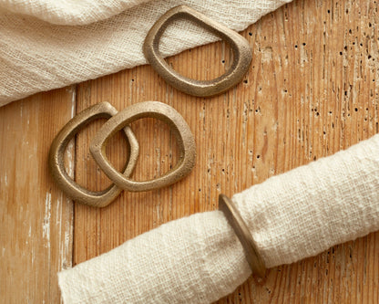 The Elmsley brass napkin rings set of 4 handcrafted table accents
