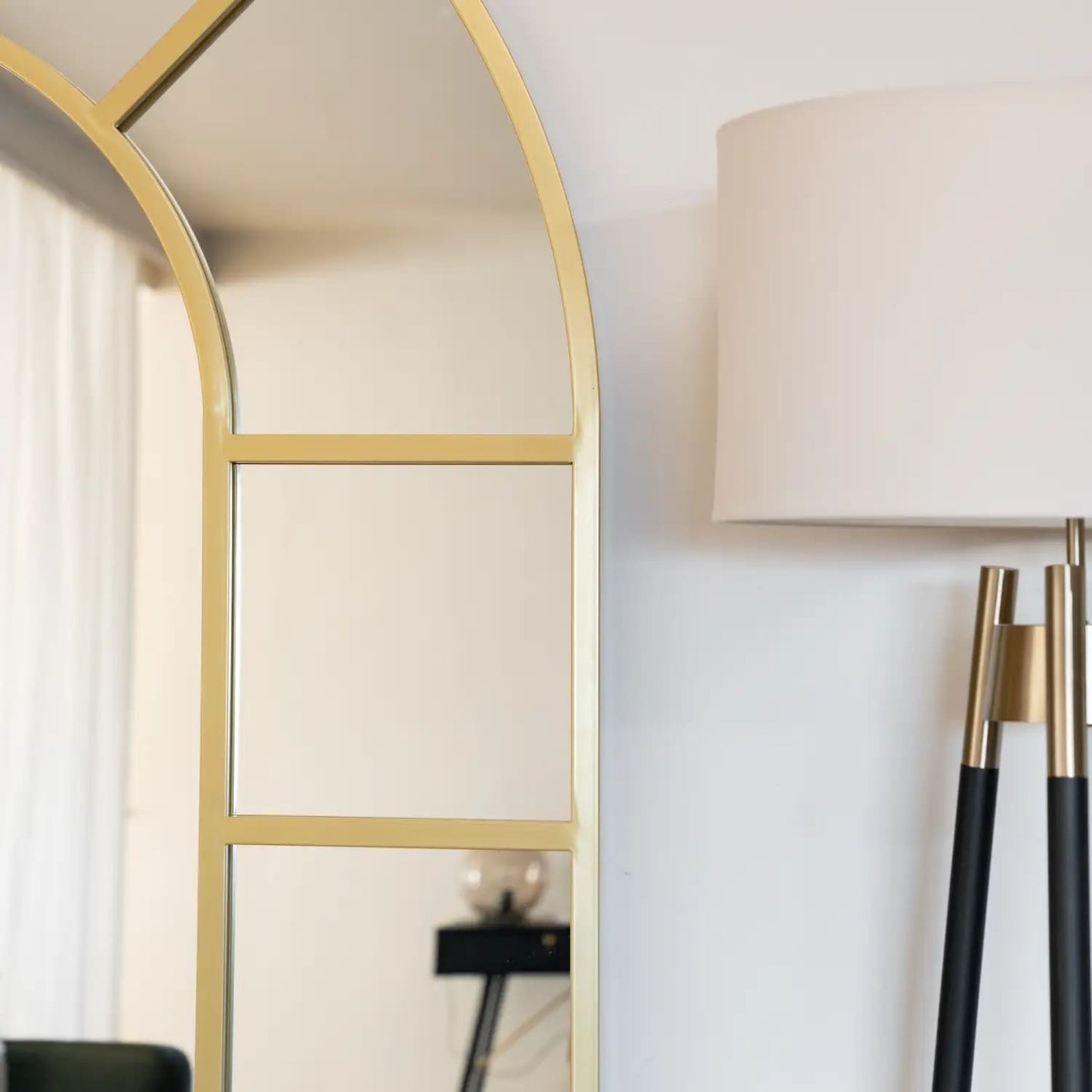 Gold arched lattice window mirror detail close-up metal frame antique gold finish UK