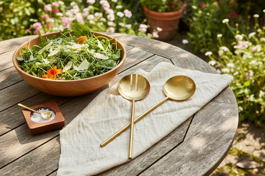 Harriet matte gold salad servers outdoor garden table spring lunch setting UK
