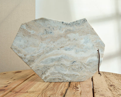 Hartley Torrent marble serving board, artisan platter for entertaining, on wooden table country style
