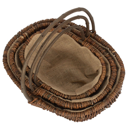 Three garden trugs oval unpeeled willow nested countryside UK