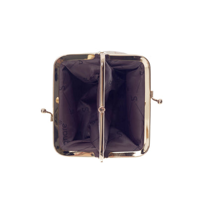 Inside view of Highland Cow Frame Purse showing double clasp compartments and patterned lining