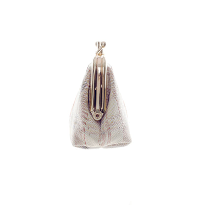 Highland Cow Frame Purse side angle view highlighting metal clasp detail
