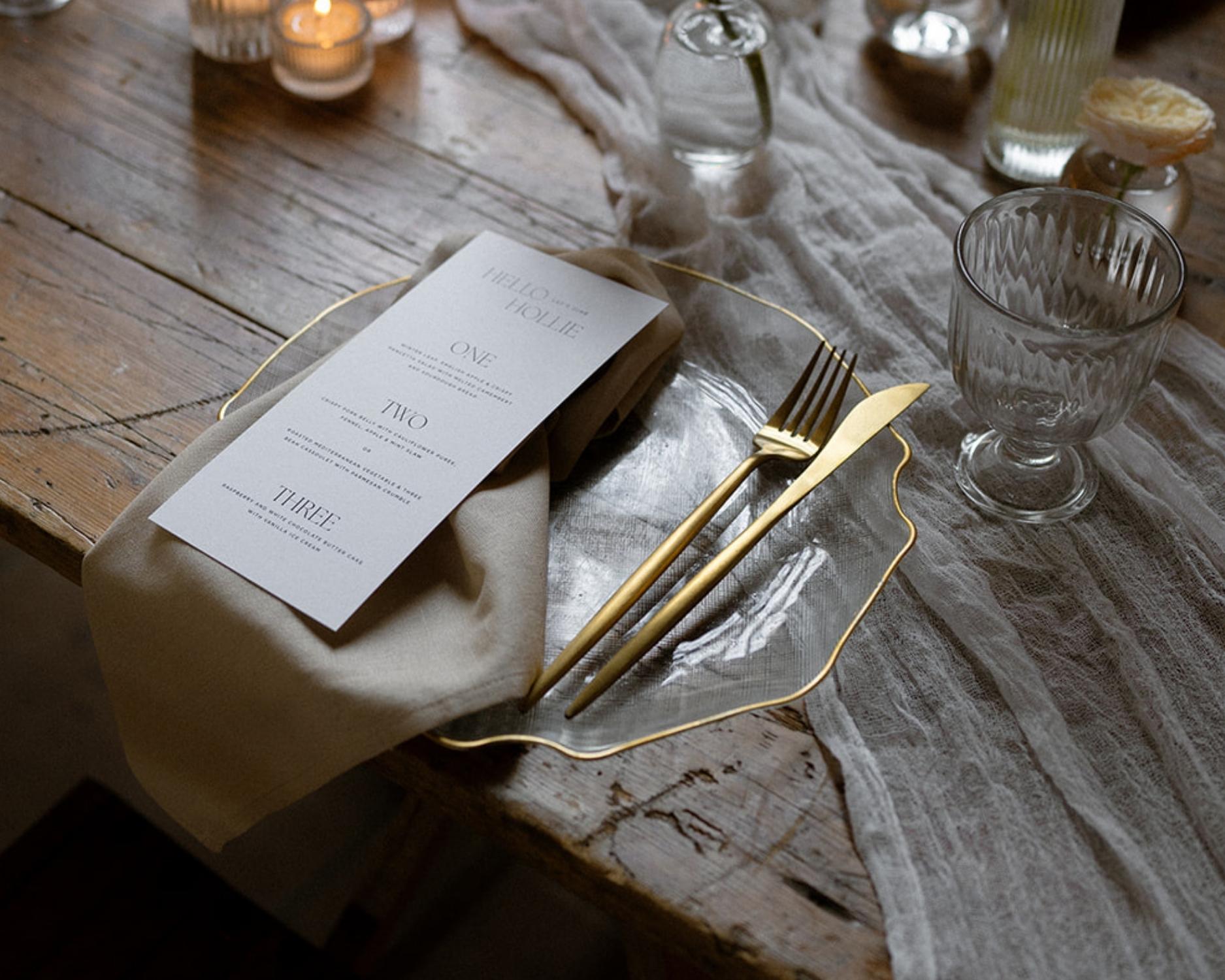 Restaurant quality gold cutlery glass charger plate formal dining table UK event
