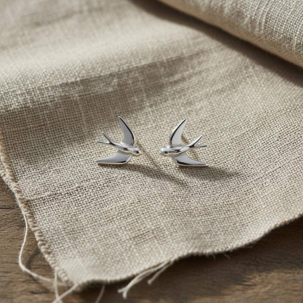 Laura Ashley Blue Birds silver stud earrings on linen - recycled sterling silver UK