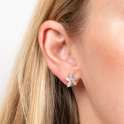 Laura Ashley Tumbling Floral stud earrings worn in model's ear silver plated UK