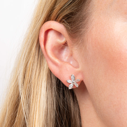 Laura Ashley Tumbling Floral stud earrings worn in model's ear silver plated UK