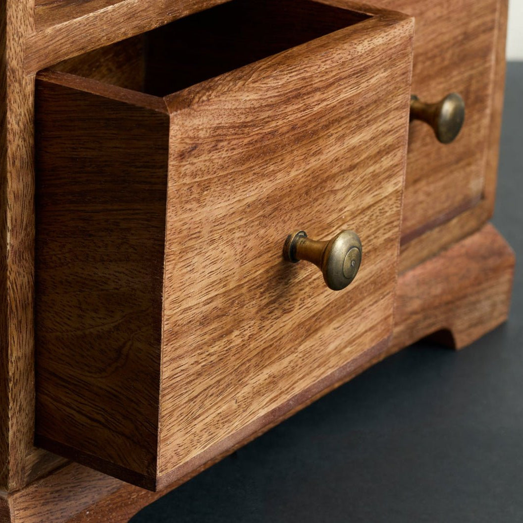 Mango wood cabinet drawer close-up carved handle UK smooth gliding storage