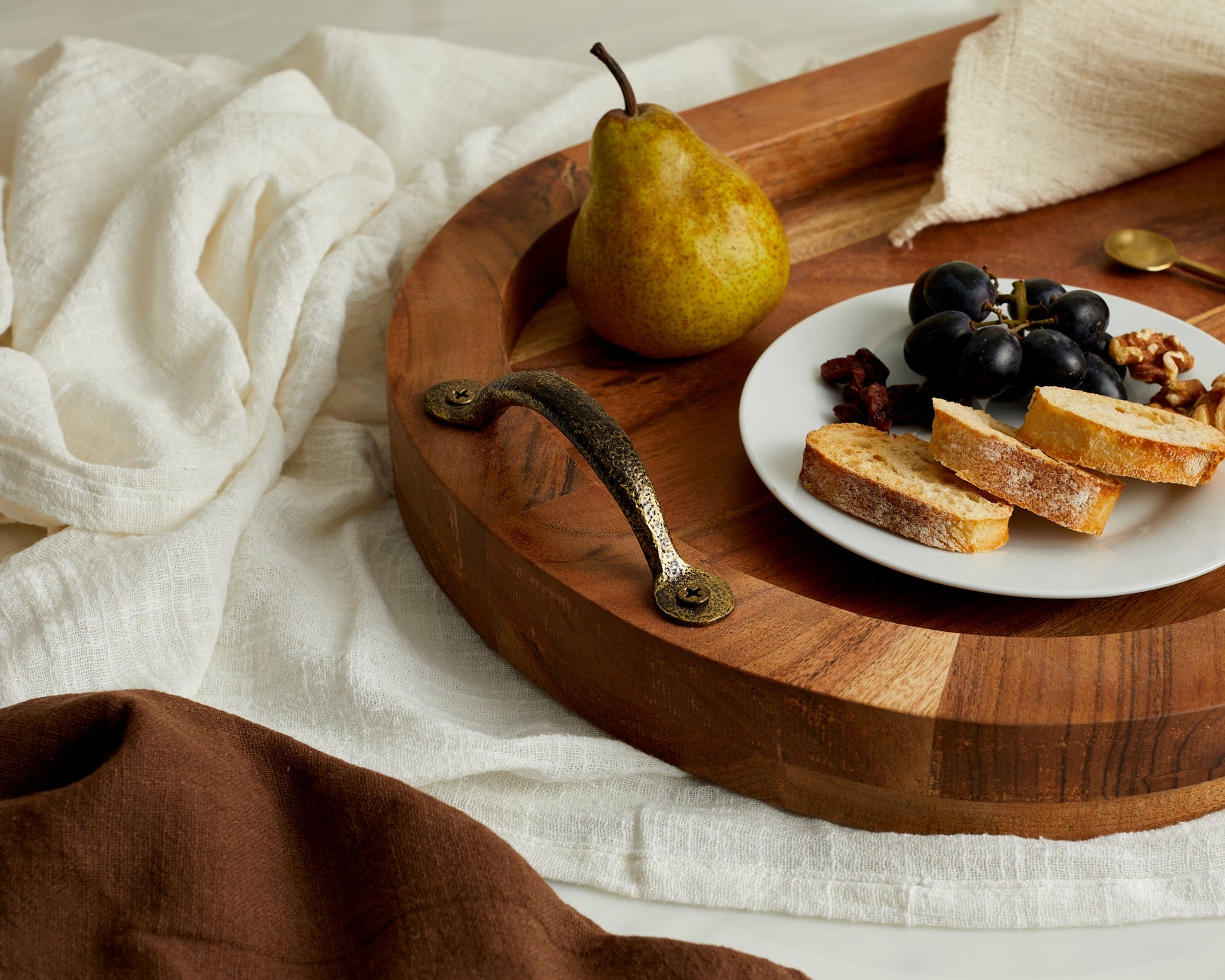 Oval fir wood tray Branlow Hearth Tray close up view of antique brass handle detail
