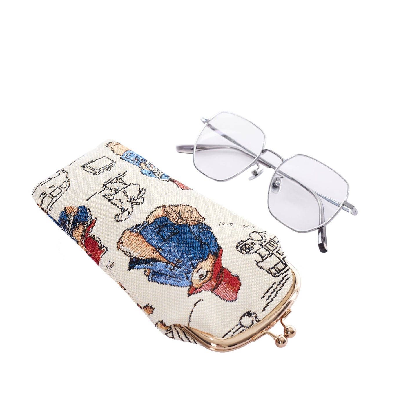 Paddington Bear tapestry glasses case in multicolour with clasp, shown beside glasses on white background, compact and protective pouch