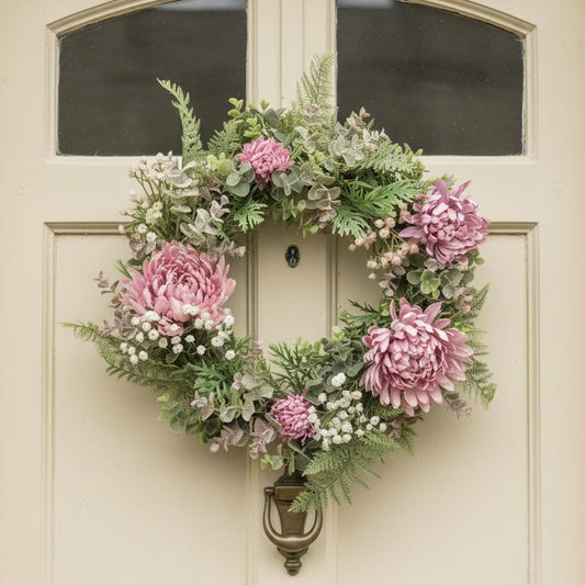 Pink chrysanthemum wreath cottage front door welcoming entrance UK home