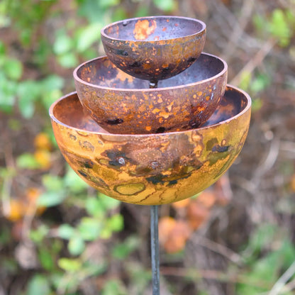 Rusted fountain stake three-tier rain catcher weathered steel birdbath cottage garden UK
