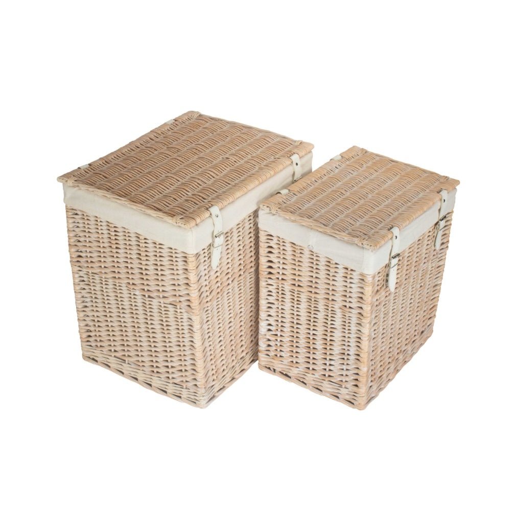 Pair of Edith’s Washday Baskets – white-washed wicker laundry hampers with hinged lids, faux leather straps, and removable cotton linings, styled for soulful home organisation and vintage washday rituals.