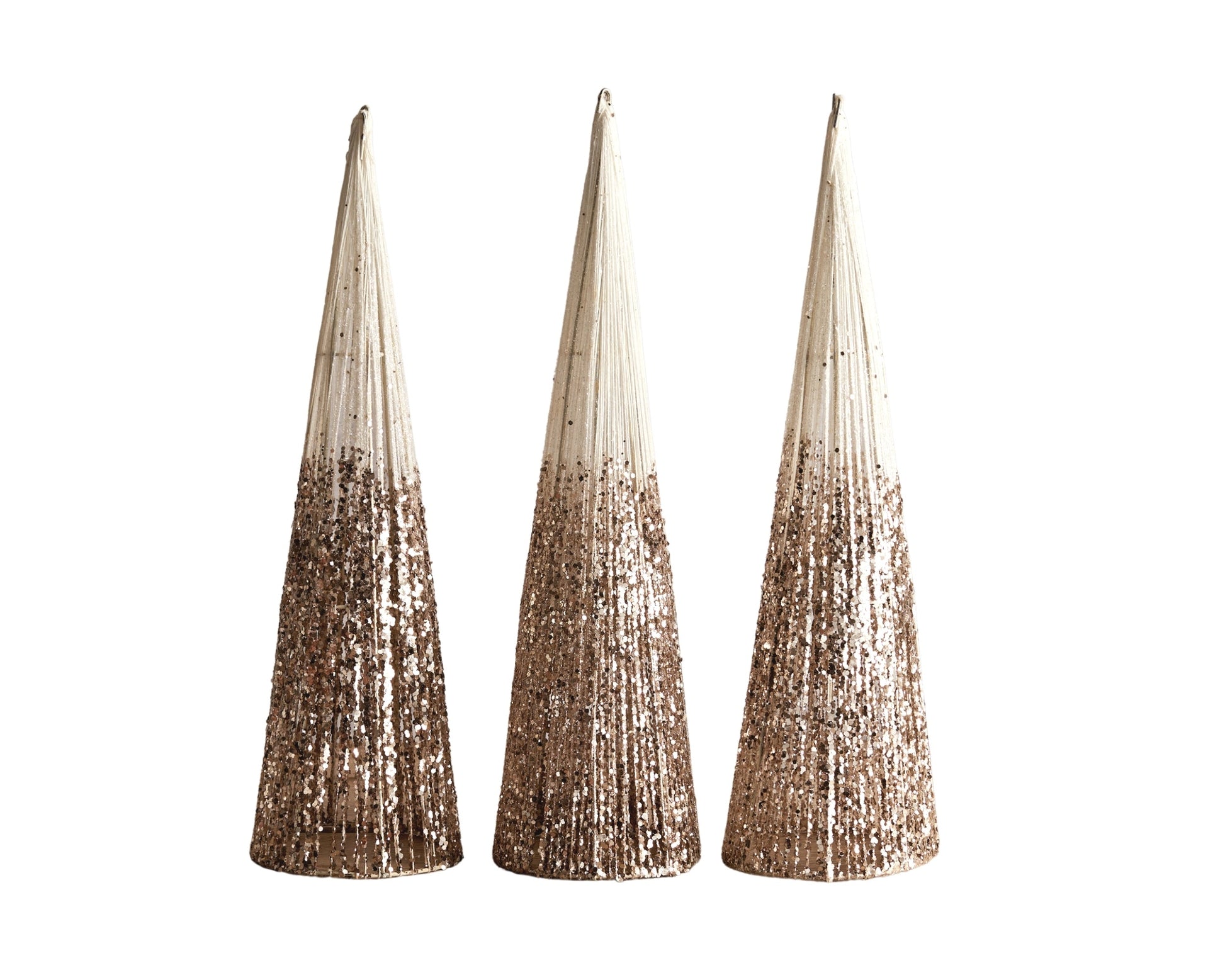 Set of three snowed Christmas cone trees festive mantel decorations on blank background
