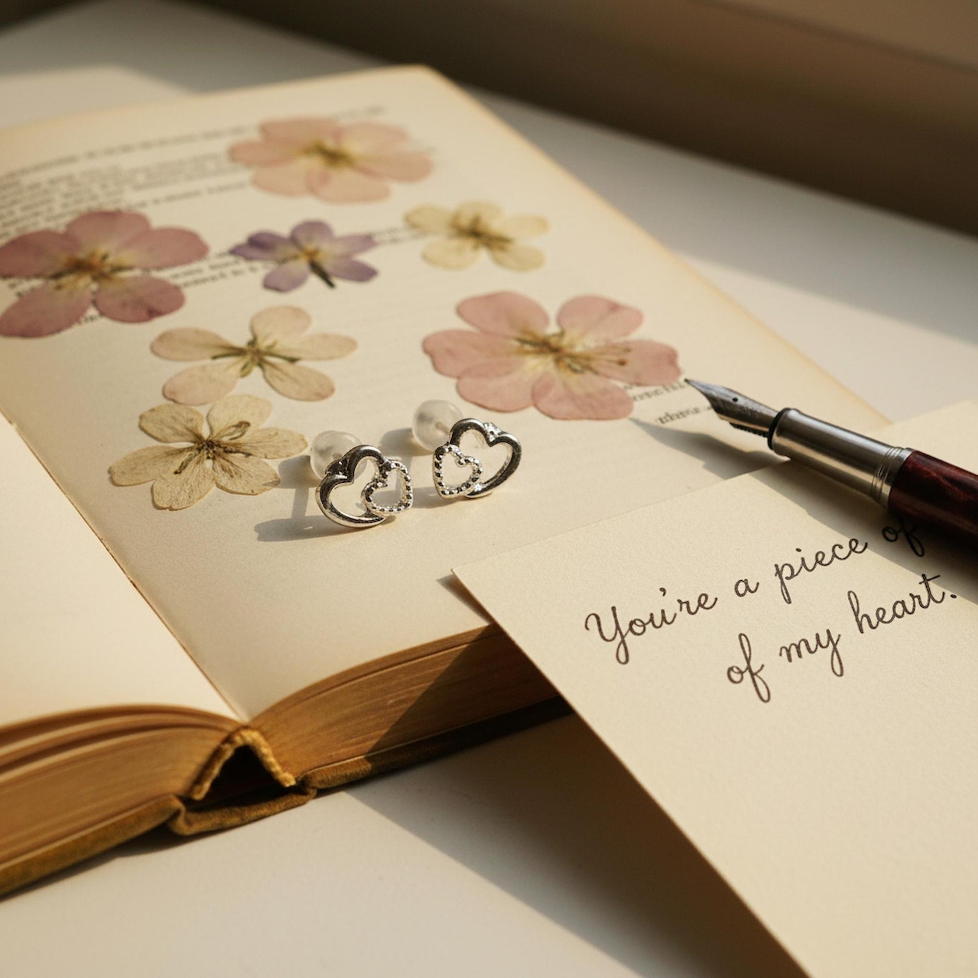 Two hearts silver stud earrings vintage book piece of my heart Mother's Day UK meaningful gift mum
