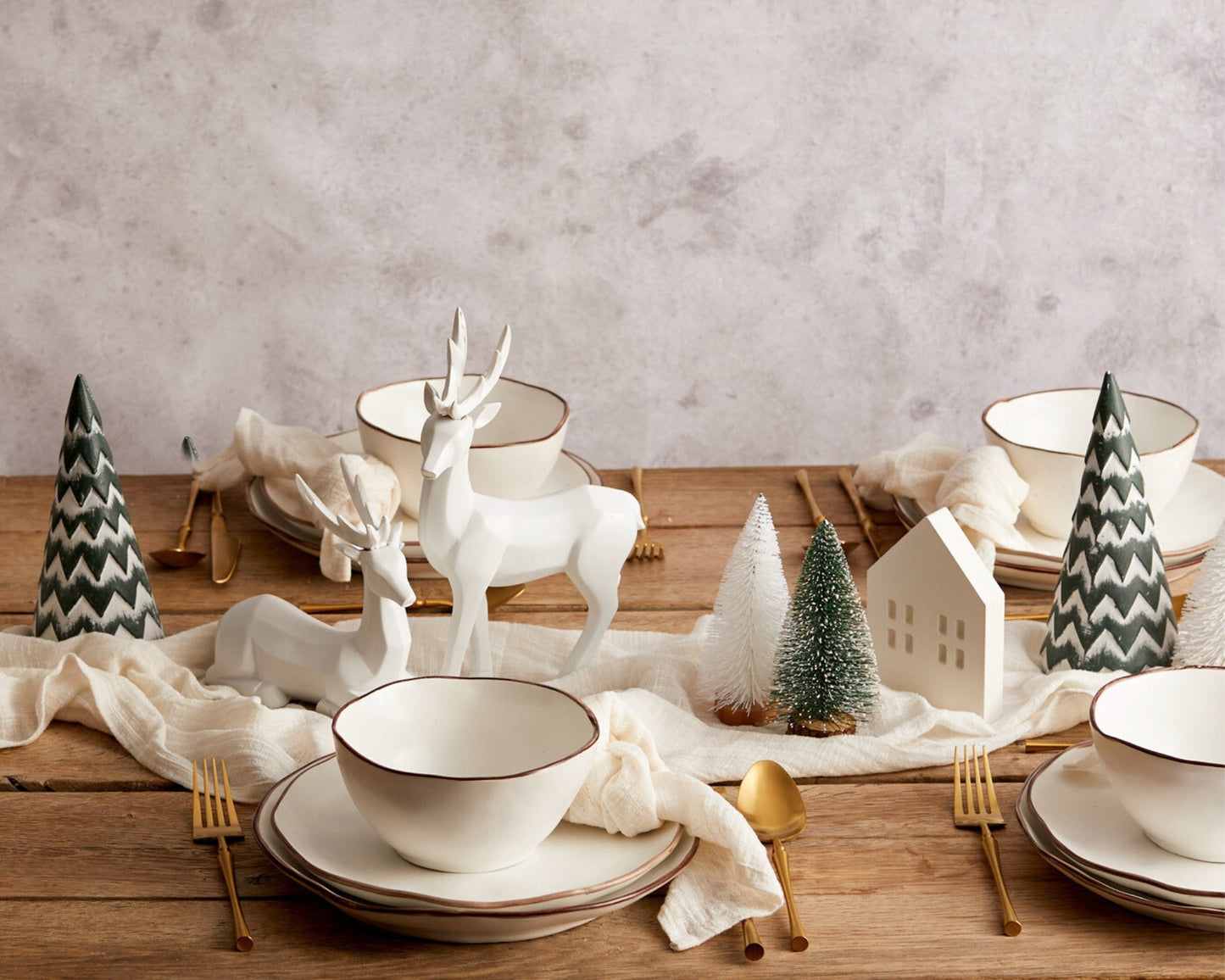 Whisper of Snow wooden Christmas tree rustic festive decor UK styled within a tablescape
