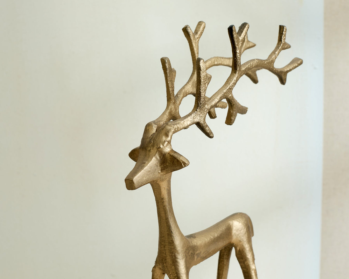 Wickham gold reindeer ornament festive mantel decor UK close up detail
