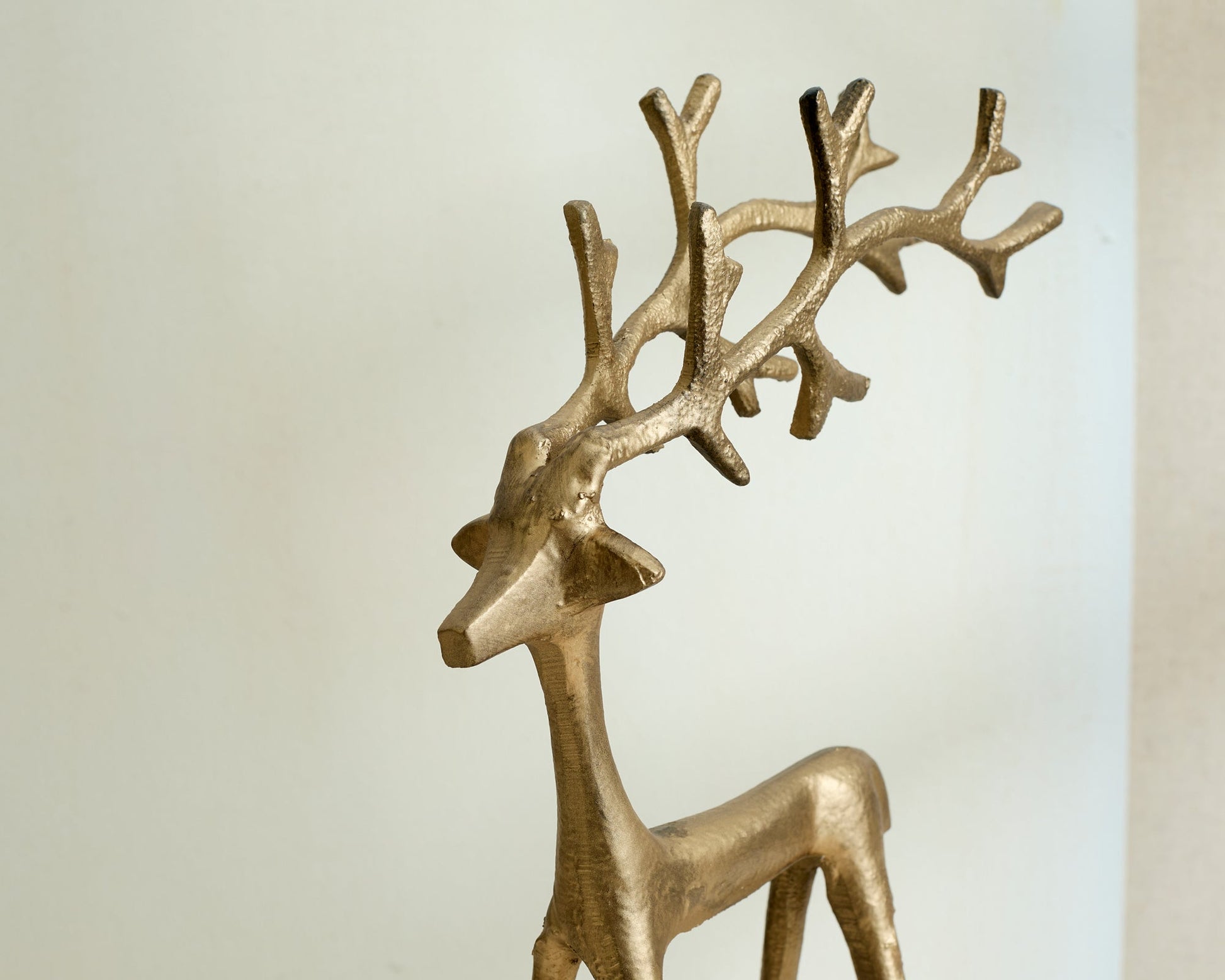 Wickham gold reindeer ornament festive mantel decor UK close up detail
