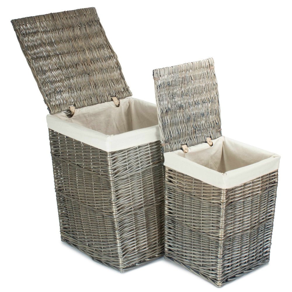 Set of two square wicker laundry baskets antique wash with lids open showing cotton lining